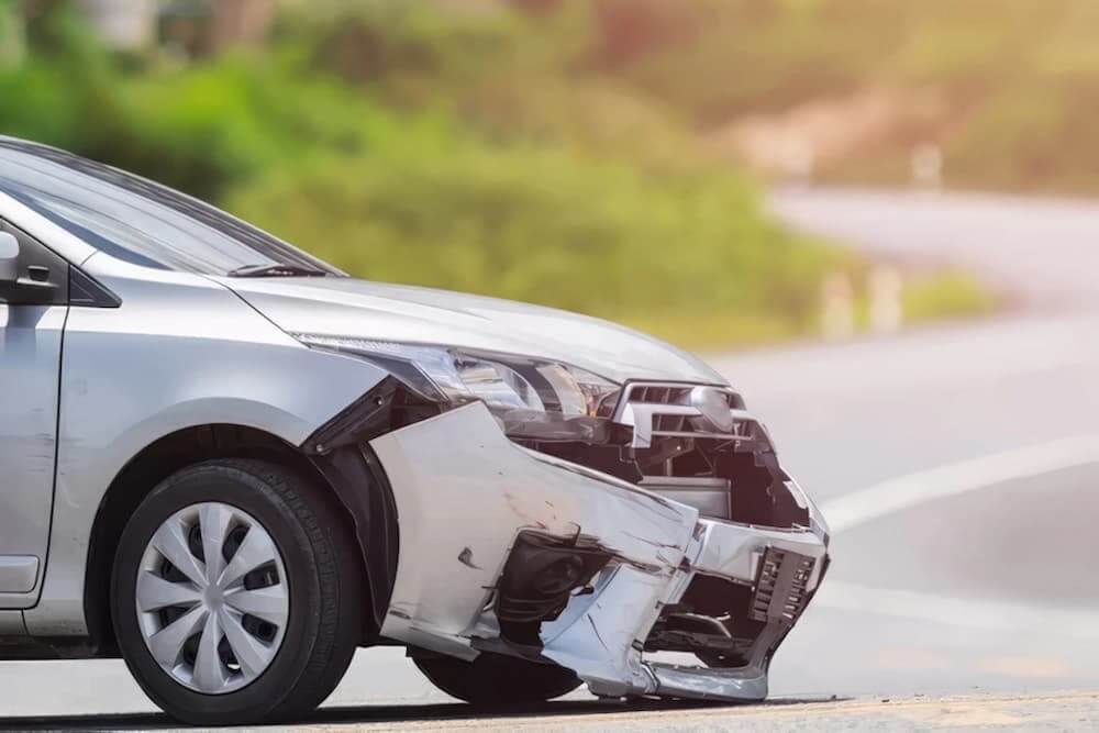 Bumper fallen white car
